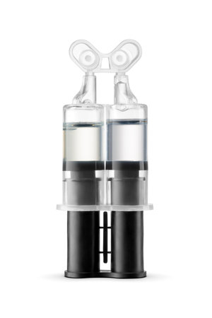 Syringe with two-component adhesive epoxy resin glue isolated on white background.の写真素材