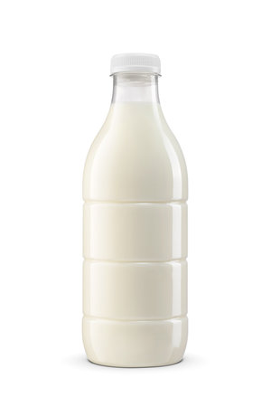 Milk in transparent plastic bottle isolated on white background.の写真素材