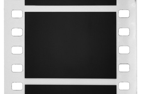 Film strip showing an empty frame for movie or retro video isolated on white background.の写真素材