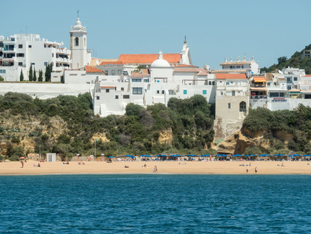 A photo of some city visible from a boat near the Algarve coast in Portugal, 2016の写真素材