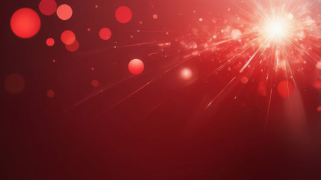 Red and white bokeh lights on a dark background.の素材