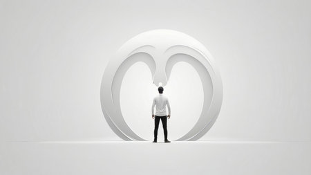 A man stands before a large, abstract, white sculpture.の素材