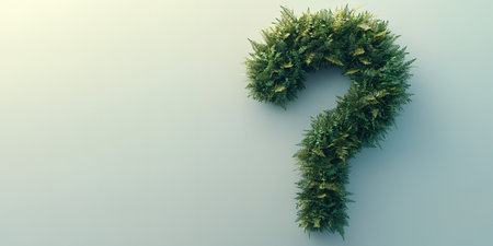 A question mark made of lush green foliage.の素材