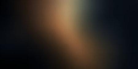 Abstract gradient background in warm, dark tones.の素材
