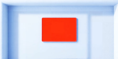 Bright red rectangular panel mounted on a light blue textured wall Clear details and vibrant color...の素材