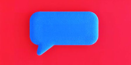 A fuzzy blue speech bubble is centered on a vibrant red background Clear details and vibrant color...の素材
