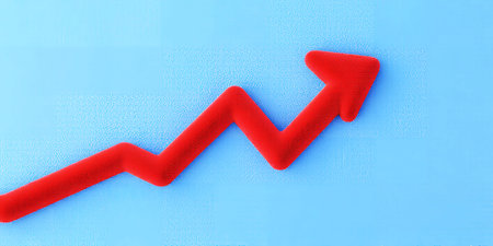 A red arrow graph trending upwards on a bright blue textured background. Clear details and vibrant...の素材