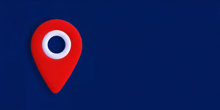 Red location pin icon with white circle on blue background Clear details and vibrant colors enhanc...の素材