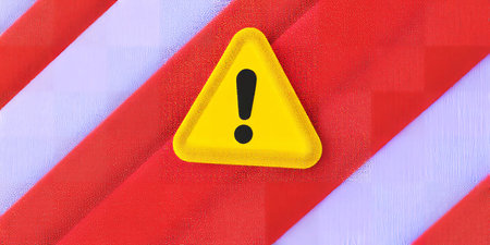 A yellow exclamation mark warning sign is centered on bold red and white diagonal stripes.の素材