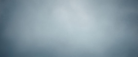 A plain gray background with a subtle light source.の素材