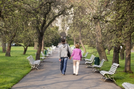 couple of middle-aged walk in the parkの写真素材