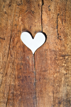 Heart symbol wood holeの写真素材