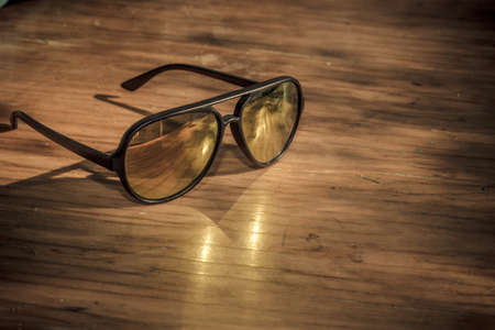 Sun glasses on vintage tableの写真素材
