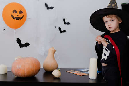 Kids on Halloween. Funny boy in a Halloween costume . Happy Halloweenの写真素材