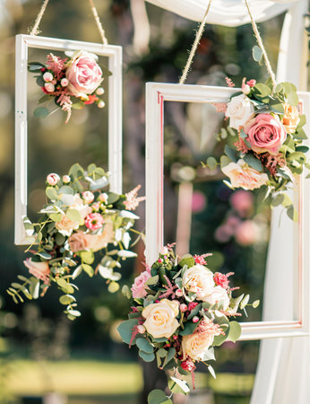 Wedding arch decorated with roses and eucalyptusの素材