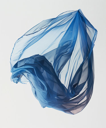 abstract piece of transparent fabric flying, high-speed studio shotの素材
