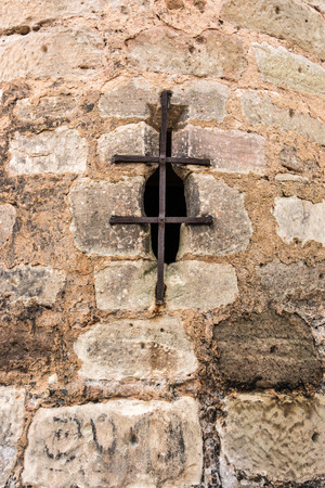 Emprasure in a big wall of the cloisterの写真素材