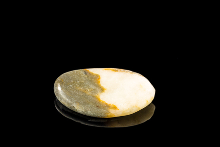 Colorful stone with different designs and colors and black backgroundの写真素材