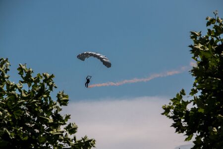 German skydiver in the air with German flag