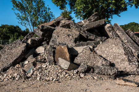 A bunch of building waste on the groundの写真素材