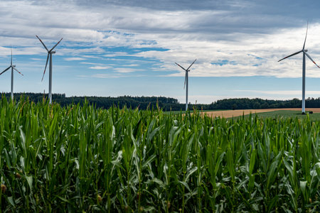 Big windmills for wind power on the fieldの写真素材