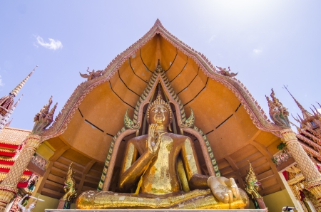 a big golden buddha at wat thum sua, karnchanaburi, thailand の写真素材