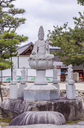 Worship statues at miyajima, japan.の写真素材