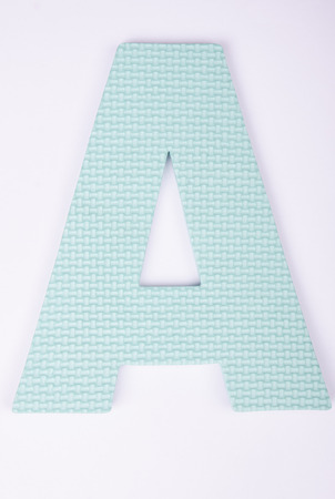 alphabet  A made from foam on white backgroundの写真素材