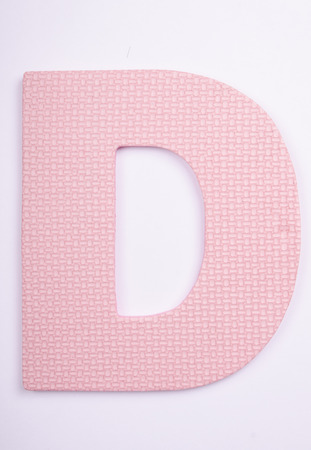 alphabet D made from foam on white backgroundの写真素材