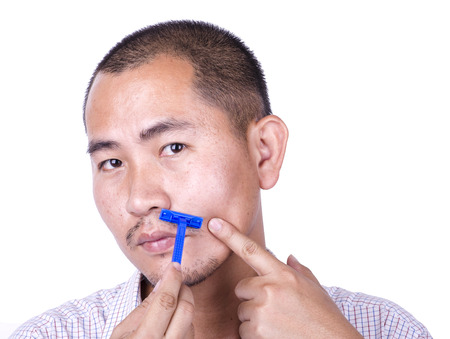 asian man's shavingの写真素材