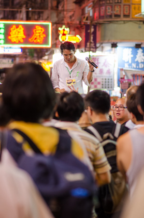 HONG KONG, OCT 15: protesters stand listening to speech in Mongkok on 15 October 2014.People protest for urban development  and mainland china policy to hong kong. more people join the protestのeditorial素材