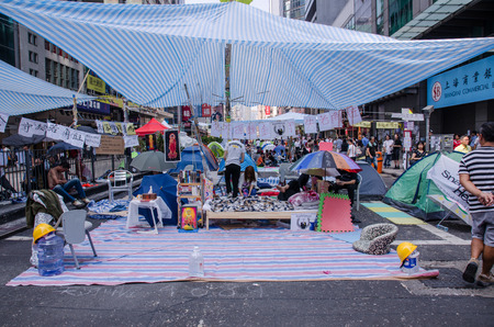 HONG KONG, OCT 15:  protesters occupy the road in Mongkok on 15 October 2014. they protest to free  election from china. they called Umbrella Revolution.のeditorial素材