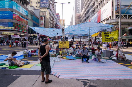 HONG KONG, OCT 15:  protesters occupy the road in Mongkok on 15 October 2014. they protest to free  election from china. they called Umbrella Revolution.のeditorial素材