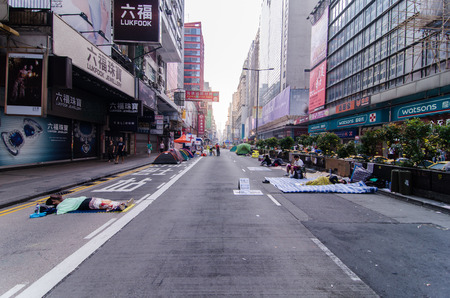 HONG KONG, OCT 16: young protesters sleep on the nathan road in Mong Kok on 16 October 2014. they rest in the morning after protest during all night.のeditorial素材