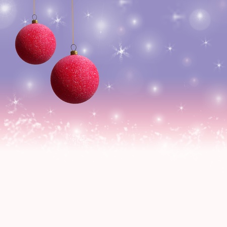 Christmas background with pink, white and purple colours depicting balls and snowの写真素材