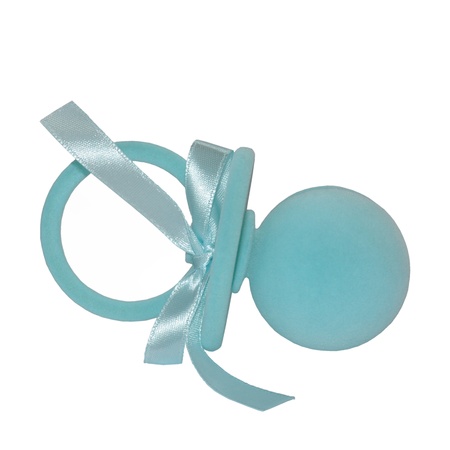 Blue casket for baby in the form of soother with a satin ribbon isolated on white backgroundの写真素材