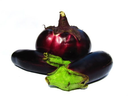 Three ripe eggplants isolated on white background       の写真素材