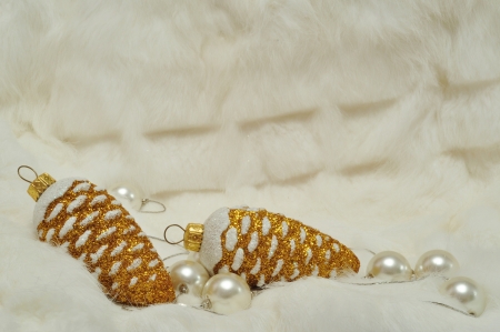 Christmas decorations in gold and white with free spaceの写真素材
