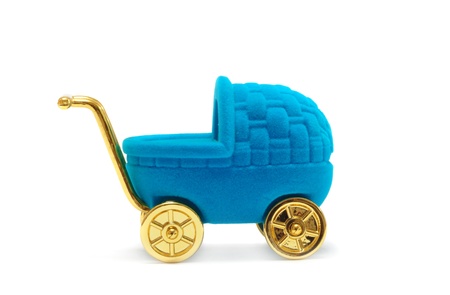 Gift casket in the form of baby stroller isolated on white backgroundの写真素材