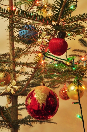 Christmas tree decorated with toys and sparkling garlandsの写真素材