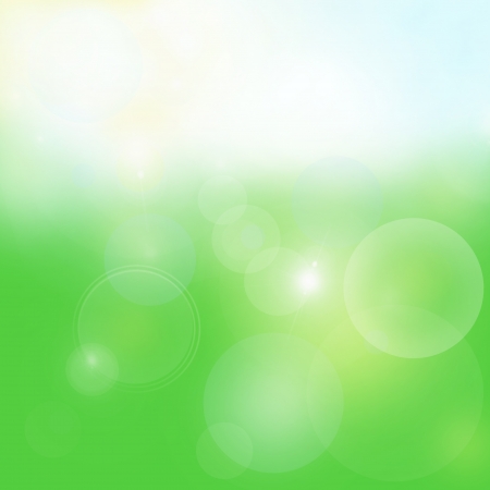Spring bright green background with bubbles and glowの写真素材
