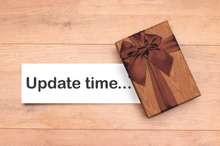 text Time To Update with gift boxの写真素材