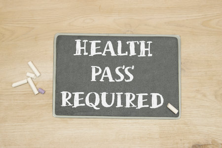 health pass required written in chalkboardの写真素材