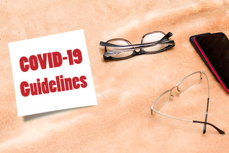 onceptual photo about covid guidelines