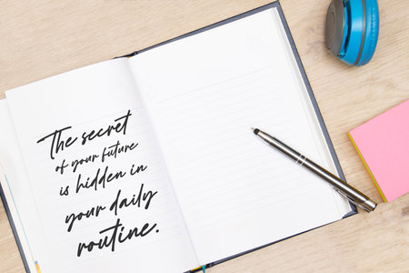 Handwriting text writing Your Daily Routine Matters on notebook