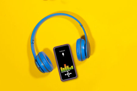 Podcast background. Mobile smartphone screen with podcast application, sound headphones