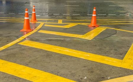 Strict traffic area divided by traffict cone and sign on road in front of a department store の写真素材