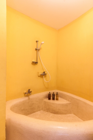 The inside of yellow modern bathroomの写真素材