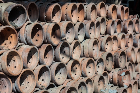 The stack of store old clay potteryの写真素材