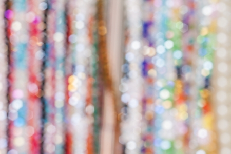 Blur background of colourful bead necklaceの写真素材